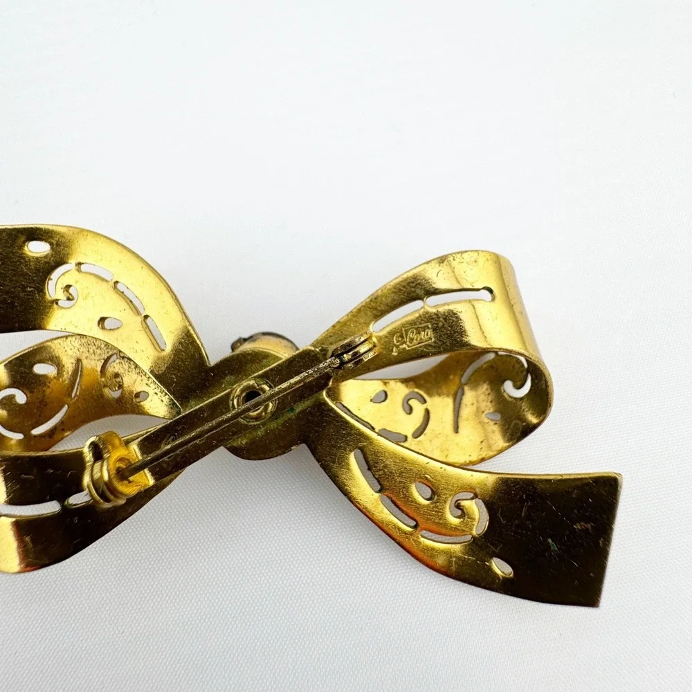 Vintage Coro Gold Tone Filigree Bow Brooch Pin Amber Rhinestone Center